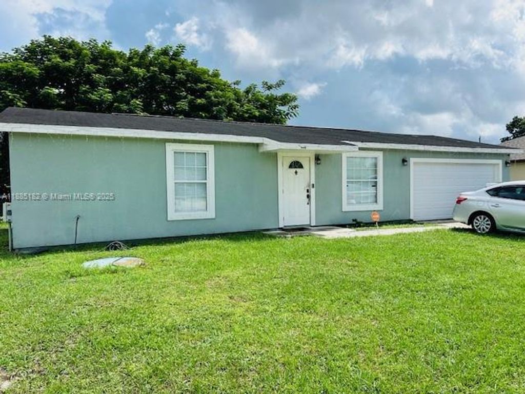 Photo of 849 SW Bayshore Blvd, Port St Lucie, FL 34983 (MLS # A11885182)