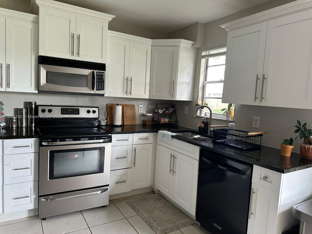 Photo of 849 SW Bayshore Blvd, Port St Lucie, FL 34983 (MLS # A11885182)