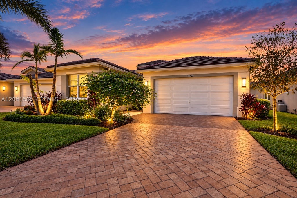 Photo of 11797 SW Coral Cove Pkwy, Port St Lucie, FL 34987 (MLS # A12091685)