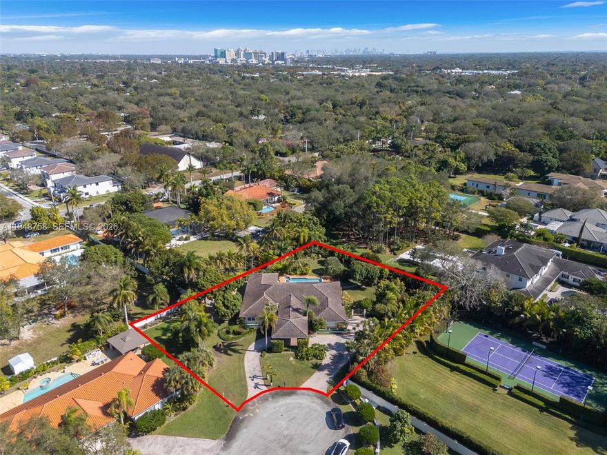 LA PREMIERE Realty proudly presents an exceptional residence tucked away on a serene cul-de-sac at 8535 SW 113th Terrace, just off Killian Drive. This refined estate offers 5 bedrooms and 4 bathrooms, volume ceilings, formal living and dining rooms, and a 2-car garage  thoughtfully designed to accommodate Family or multigenerational needs.
Set on an impressive 0.77-acre lot, the grounds are a true highlight. Lush landscaping, mature fruit trees, a heated pool and expansive green areas  create a private oasis rarely found in this area, perfect for entertaining family and friends.
Ideally located just minutes from US-1, the property offers quick access to premier conveniences: 10 minutes to Baptist Hospital,  17 minutes to Miami International Airport, and close proximity to top-rated schools, parks, and essential amenities. This is a rare opportunity to enjoy space, seclusion, and accessibility in one of the area’s most desirable neighborhoods.