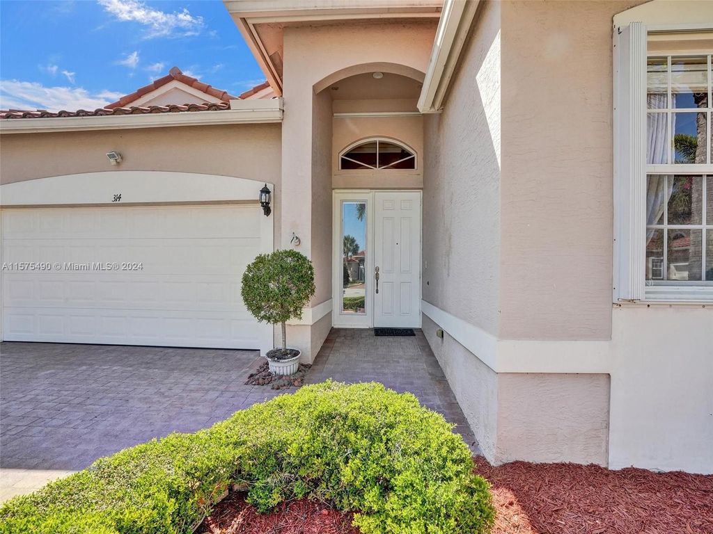 Photo of 314 NW Seacrest Ct, Port Saint Lucie, FL 34986 (MLS # A11575490)