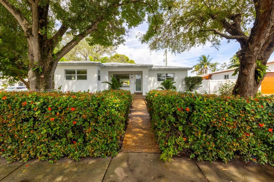 Beautifully renovated home in Dania Beach! This 3BR/3BA property features 2 en-suite bedrooms and sits on a generous 8, 720 sq ft lot. Recently updated with brand-new electrical, plumbing, and a new A/C installed last month. Impact windows throughout, modern finishes, and thoughtful design make this home stand out in the area. Large backyard with room for a pool, perfect for entertaining or family gatherings. Move-in ready and centrally located near beaches, highways, and shopping. A rare opportunity!