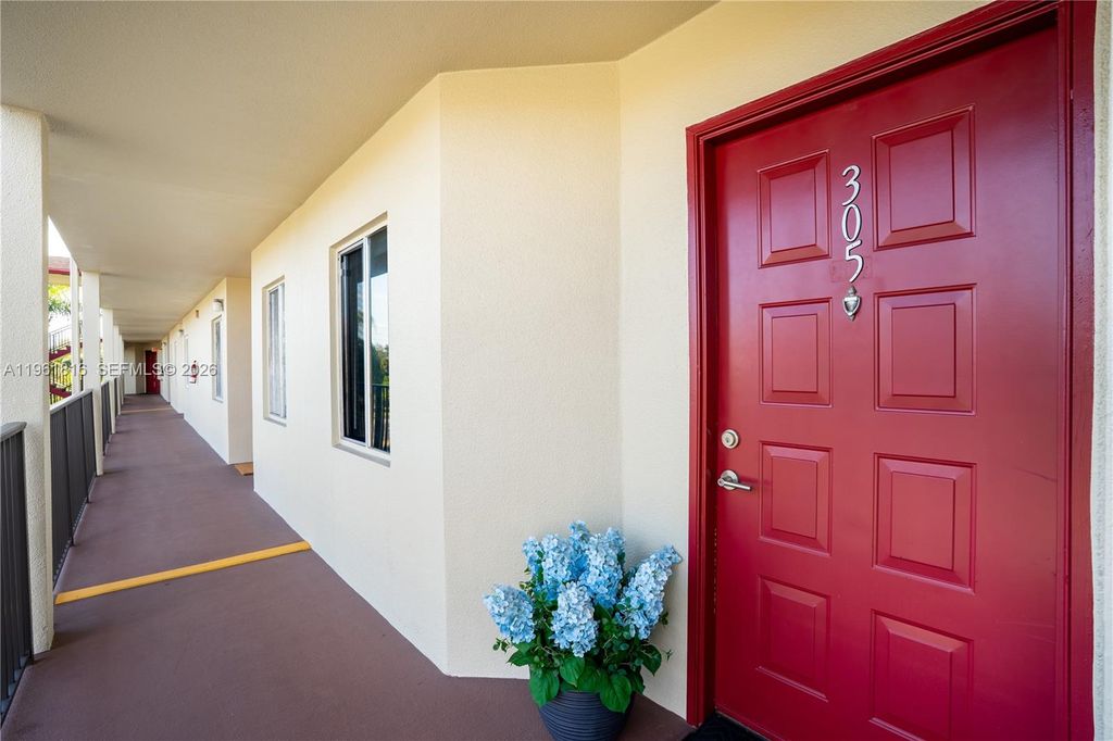 Photo of 1600 SW 127th Way #305C, Pembroke Pines, FL 33027 (MLS # A11961816)