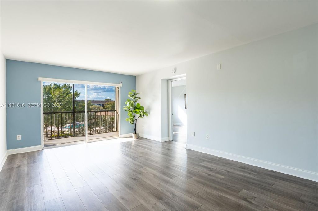 Photo of 1600 SW 127th Way #305C, Pembroke Pines, FL 33027 (MLS # A11961816)