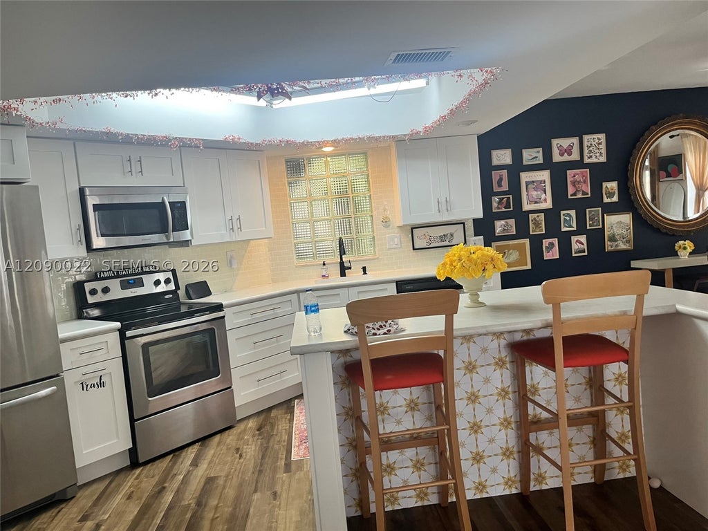 Photo of 4386 Hazel Ave #C, Palm Beach Gardens, FL 33410 (MLS # A12090022)