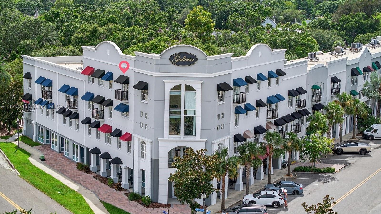 Experience stylish, maintenance-free living in this beautifully updated 2-bedroom, 2.5-bath unit located in Oldsmar Galleria. This top-floor unit offers over 1,553 sqft of open living space, featuring high ceilings, abundant natural light, and a private balcony accessed through French doors. The split-bedroom layout provides privacy, with both bedrooms offering en-suite baths. The modern kitchen includes granite countertops, a breakfast bar, oak cabinetry, and stainless steel appliances, including a dishwasher. Luxury vinyl flooring, creating a clean and updated look. A laundry room with a washer/dryer is conveniently located inside the unit. secure. Pet-friendly. Whether you're looking for a primary residence, second home, or rental investment, this unit is move-in ready!