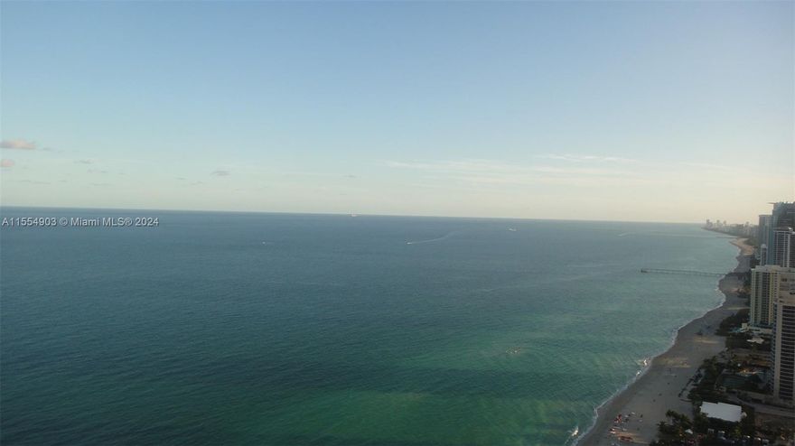 RARELY EVER AVAILABLE!! LOWER PH FLOW THRU WITH THE MOST INCREDIBLE VIEWS!! DIRECT OCEAN, SOUTHEAST COASTLINE VIEW, MIAMI SKYLINE AND INTRCOASTAL VIEWS!! HIGH CEILINGS! THIS RESIDENCE HAS 4 BEDROOMS PLUS AN EXTRA 5TH ROOM THAT CAN BE A DEN, OFFICE, MOVIE THEATER ROOM ETC. ONE OF LARGEST RESIDENCES AT INTHE BUILDING! ENJOY ALL THE LUXURY RESORT STYLE AMENITIES -FOOD AND DRINKS SERVICE, 4 SWIMMING POOLS, SPA, GYM WITH OCEAN VIEWS, DOG PARK AND MORE!!!