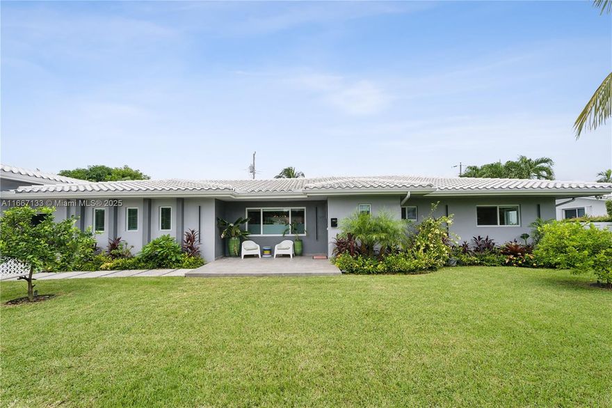 Executive Style Home in Sans Souci Estates! This stunning 4-bedroom, 3-bath residence features a spacious 19’x20’ office/gym, a full 2-car garage, and a separate 18’x12’ air-conditioned laundry/storage area. Entertain in style with a gorgeous pool, raised waterfall Jacuzzi, and an outdoor kitchen set amidst synthetic grass. The luxurious master suite boasts a spa tub, multi-jet shower, dual sinks, and two walk-in closets. Fully fenced front and back yards offer privacy. New roof (2020). Turnkey and just 5 minutes from Bay Harbor/Bal Harbor Islands and the beaches! Don’t miss out!