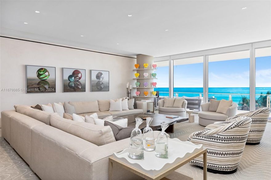 Discover luxury reimagined in this meticulously renovated 4BD 5.5BA condo at the prestigious Four Seasons Surf Club. Boasting 4,305 SF of living space, this NE corner residence offers breathtaking ocean views from its expansive wraparound terrace. This is one of the few layouts w/ a large open kitchen facing the ocean. Indulge in world-class amenities, including a Michelin-starred restaurant, spa, fitness center, pool & beach service. The smart home system, featuring Lutron, Control4, & Sonos, ensures effortless living. Remastered by London Based Thorp Design w/ high-quality finishes like micro cement walls, natural stone, custom millwork & lighting, this home is a testament to refined taste. A private retreat within a world-renowned resort, this residence is a piece of architectural art.