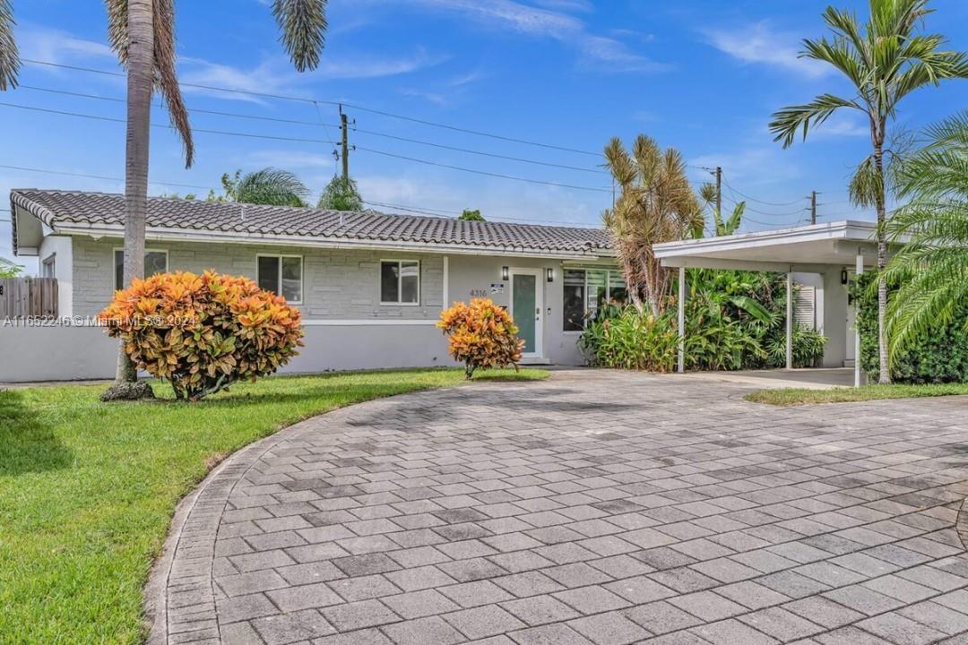 Beautiful 2/2 home in Hollywood Hills with an open floor plan leading to a tropical retreat. Features include new windows, a contemporary kitchen with granite counters and a built-in banquet, terrazzo floors, new AC, a 2004 roof, circular paver driveway, carport, and hurricane shutters. 2 Large bedrooms overlook the pool, tropical landscaping, and private backyard. Ideal for families relocating to Florida. Walking distance to several houses of worship and just 6.3 miles from Hollywood Beaches. Currently a licensed Airbnb—please do not disturb. Showings by appointment only with proof of funds. OPTION TO PURCHASE FURNITURE