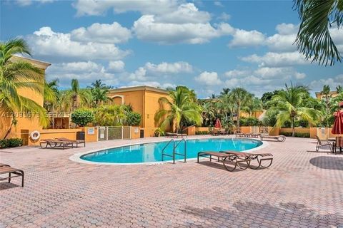Photo of 18111 NW 68th Ave #H102, Hialeah, FL 33015 (MLS # A12031671)