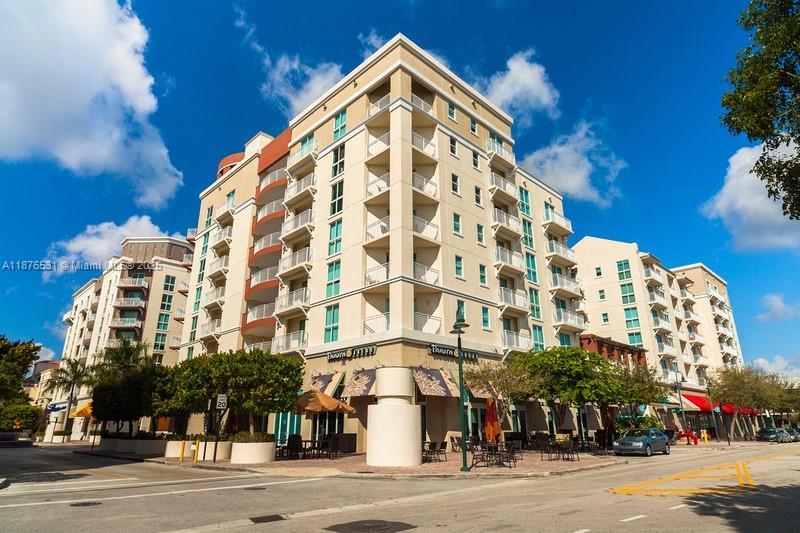 Rare to find! Two bedroom unit plus a large den at desirable Downtown Dadeland. Two levels, wood floors, and 2 covered tandem parking spaces. Excellent location acroos from Dadeland Mall, walking distance to restaurants, Supermarkets and more.