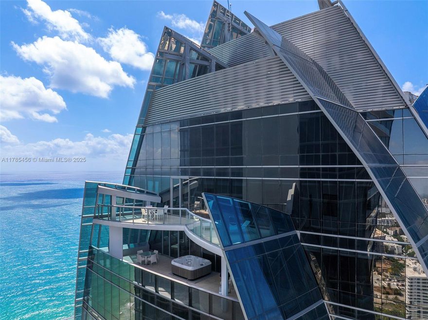 Penthouse Living Redefined at Jade Ocean. Experience the pinnacle of luxury in this one-of-a-kind sky mansion, perched atop the iconic all-glass Jade Ocean tower in the heart of Sunny Isles Beach. One of only two exclusive penthouses of its kind in the building, this two-story residence spans the entire North Towers 48 and 49th floors, offering 8,332 square feet of interior space and unparalleled views of the Atlantic Ocean and city. Every room opens to a private terrace, creating seamless indoor-outdoor living at breathtaking heights. This residence features: 6 Beds 7.5 Baths private elevators opens to your private foyer world class amenities. The building is located just minutes from fine dining, Aventura mall and Bal Harbor shops.