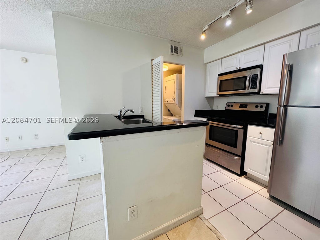 Photo of 630 S Park Rd #29-3, Hollywood, FL 33021 (MLS # A12084701)