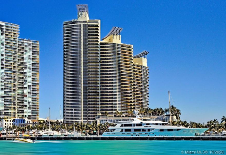 GORGEOUS WRAP-AROUND UNIT OFFERING STUNNING 270 DEGREE VIEWS OF THE OCEAN, MIAMI BEACH, GOVERNMENT CUT, FISHER ISLAND, AND DOWNTOWN MIAMI. AMAZING 4 BEDROOM, 4.5 BATHROOM PLUS DEN UNIT WITH THREE TERRACES AND PRIVATE ELEVATOR. THIS SPECTACULAR CONDOMINIUM OFFERS STATE OF THE ART SPA, POOL, TENNIS COURT, CONCIERGE, AND VALET.