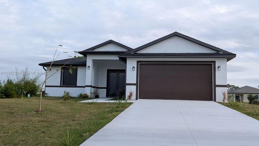 Welcome to your new home in LaBelle, FL! This modern and stunning residence has been thoughtfully designed with both comfort and style in mind. Featuring 3 bed/ 2 baths, this beauty offers 1,491 sqft of living space and a total area of 2,092 sqft. Step inside and be greeted by soaring ceilings and recessed lighting that create a bright, airy atmosphere, making every room feel spacious and inviting. The chef-inspired kitchen is the heart of the home, showcasing elegant quartz countertops and energy-efficient stainless-steel appliances—a perfect blend of sophistication and sustainability.

Enjoy the convenience of an attached 2-car garage, providing ample room for vehicles as well as additional storage. Designed to deliver both privacy and comfort, this home offers the tranquil lifestyle you’ve been dreaming of.  Discover the perfect balance of modern living and serene surroundings—schedule your private tour today and experience it for yourself!