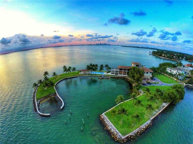 Greatest property in South Florida - EVER. Captivating waterfront 2 acre gated grand estate on a private penninsula overlooking Biscayne Bay w/the Miami skyline as a backdrop. 2000 ft water frontage. 5 story 12000 sqft 6 bedrooms 8 full baths w/stunning 360 degree water & city views. Fabulous pool & gazebo area. Private deep water yacht harbor. Property was the playground of America's elite at the turn of the century. (Vanderbilt's, Carnegie's & the likes partied here).