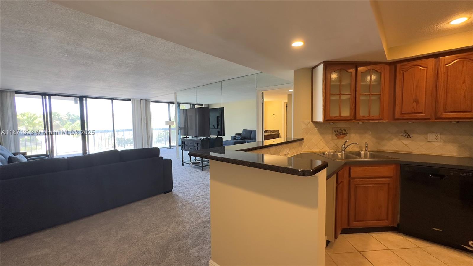 Got it — here’s a version with a polished, inviting call to action:
**Welcome to this updated 2-bed, 2-bath condo in the prestigious Lands of the Presidents. Enjoy pool views from two spacious balconies and an open-concept layout with modern finishes. The renovated kitchen boasts custom cabinetry and stone countertops, flowing into bright living and dining areas. The primary suite offers a walk-in closet and updated ensuite, while the second bedroom features abundant light and its own updated bath. A true gem in a sought-after community—bring your offers!**