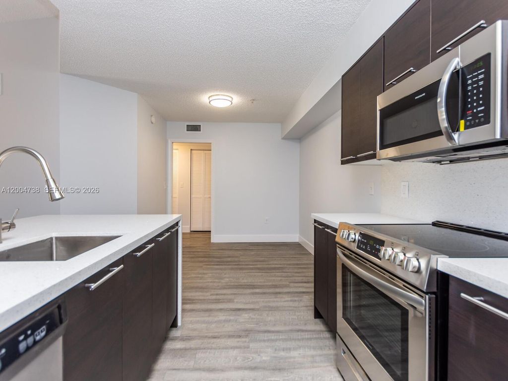 Photo of 2103 N Renaissance Blvd #308, Miramar, FL 33025 (MLS # A12004738)