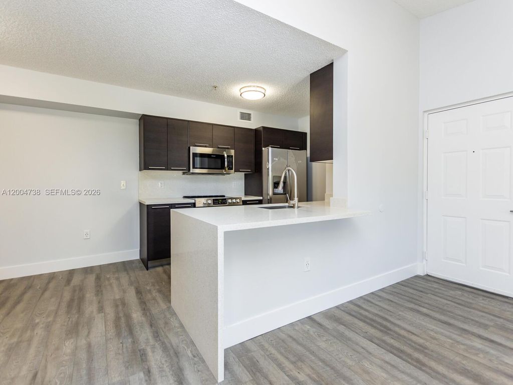 Photo of 2103 N Renaissance Blvd #308, Miramar, FL 33025 (MLS # A12004738)