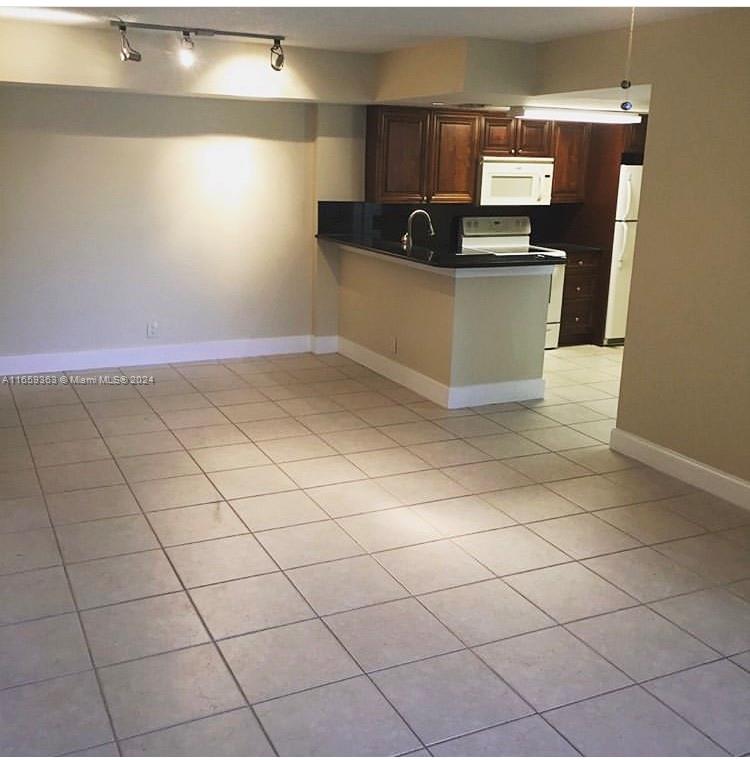 LAKES OF JACARANDA CONDO - Residential Lease