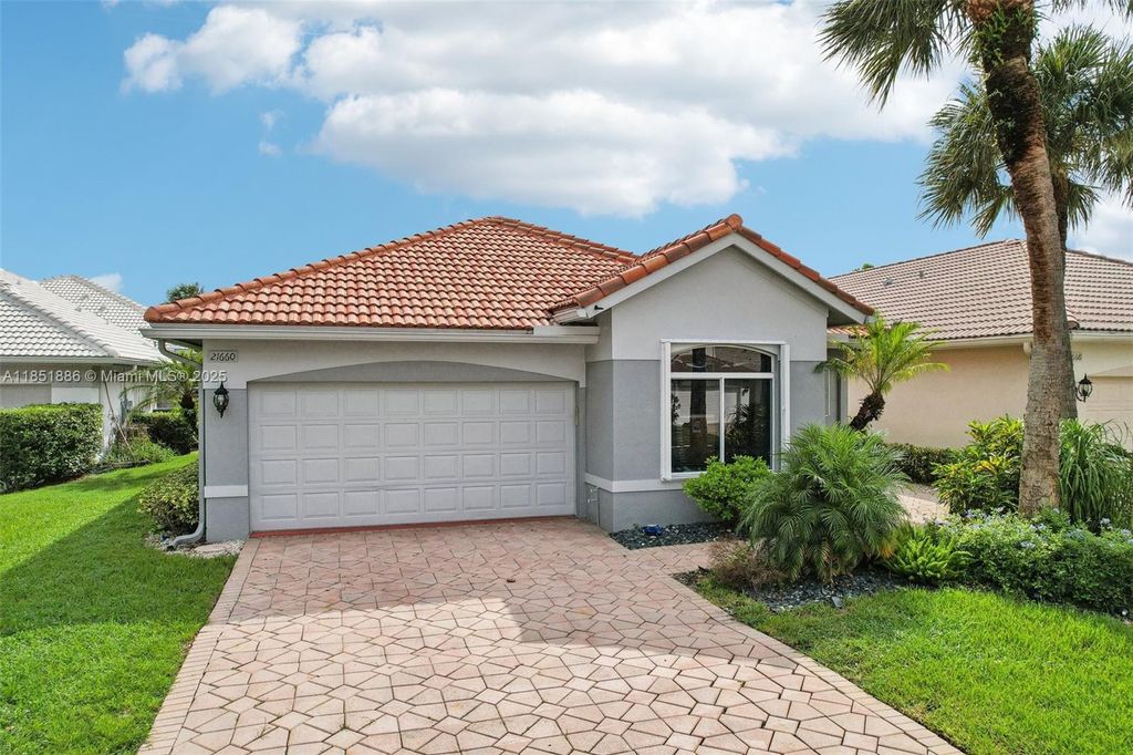 Photo of 21660 Hammock Point Dr, Boca Raton, FL 33433 (MLS # A11851886)