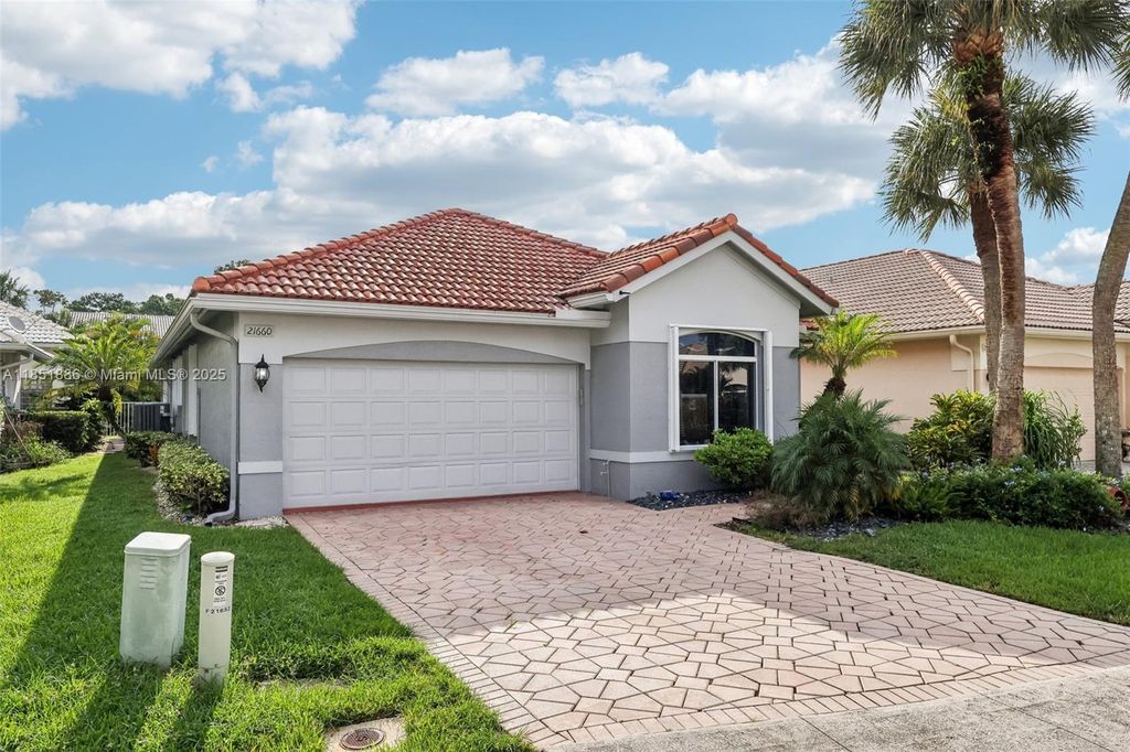 Photo of 21660 Hammock Point Dr, Boca Raton, FL 33433 (MLS # A11851886)