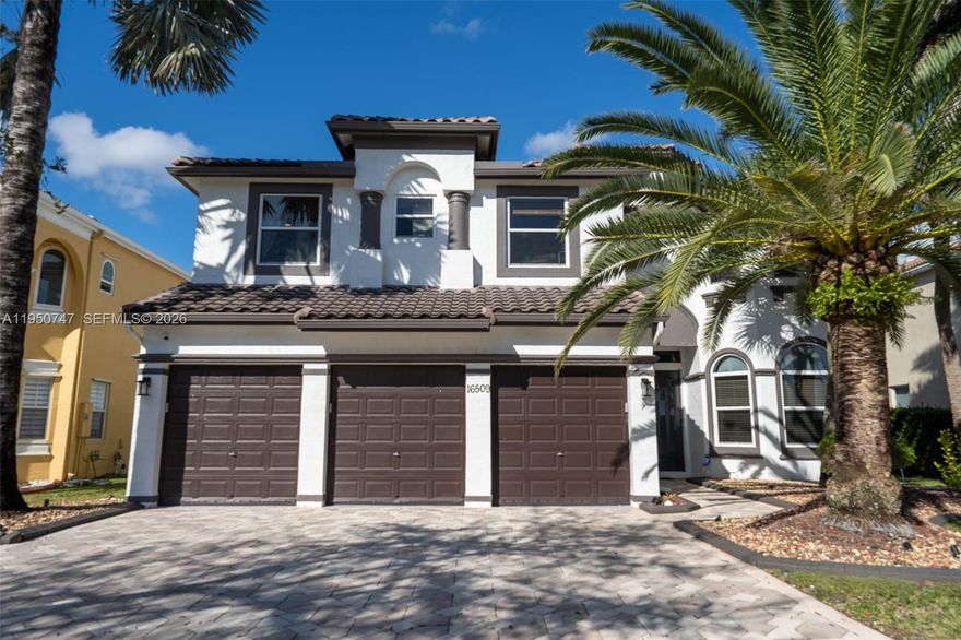 Rare waterfront home in the prestigious, guard-gated Riviera Isles! This stunning Verona model features 5BR/5.5BA and a 3-car garage with parking for 6+ cars, plus a newly installed EV charger. Enjoy ultimate peace of mind with a NEW 2022 Roof (transferable warranty), NEW 2024 Impact Windows & Doors, and NEW Wi-Fi compatible garage doors. Automatic front yard lights enhance both curb appeal and security.

The interior impresses with fresh paint, polished floors, and soaring double-volume ceilings that showcase breathtaking wide lake views. The gourmet granite kitchen boasts built-in appliances, while the primary suite offers a private sitting room, NEW custom walk-in closet, and a balcony overlooking the water. Relax in the NEW screened patios and sitting areas designed to maximize the serene lakeside setting.

Practical layout includes a 1st-floor bedroom/bath plus a cabana bath. Live the resort lifestyle with a 24/7 manned gate, clubhouse, gym, tennis, and a magnificent pool. This turn-key estate combines luxury, security, and spectacular views!

The above is information which we consider reliable, but because it has been supplied by third parties, we cannot represent that it is accurate, complete, or the most recent information and it should not be relied upon as such.