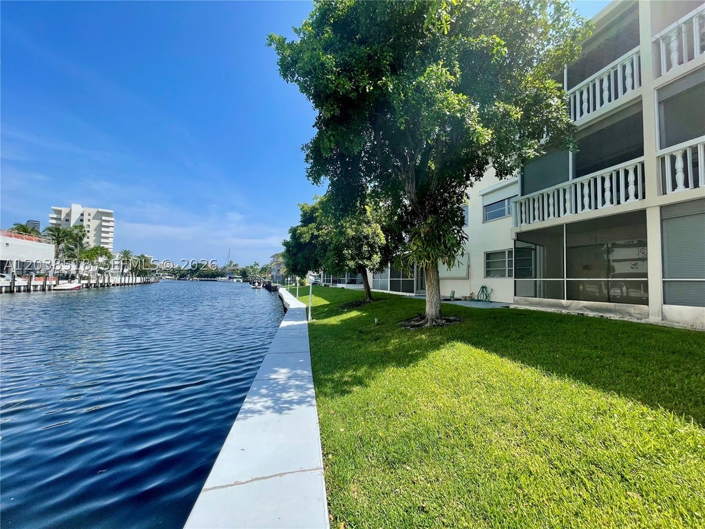 Photo of 450 Paradise Isle Blvd #205, Hallandale Beach, FL 33009 (MLS # A12038518)