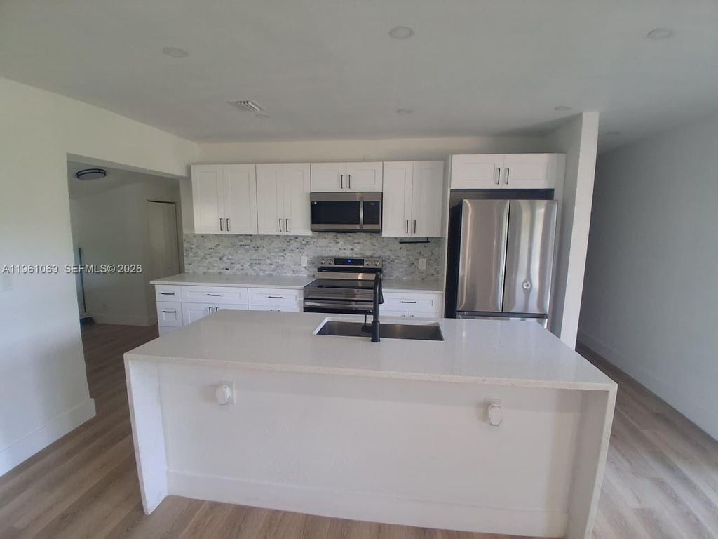 Photo of 1307 NW 16th St #1307, Fort Lauderdale, FL 33311 (MLS # A11961069)