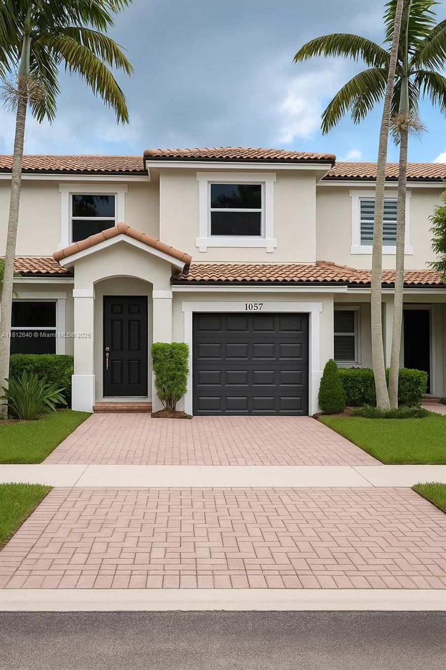 Price to sell with 10K seller credit toward buyer closing cost or interest rate buy down! Bright and spacious 3/3 with peaceful water views and added privacy from the lake buffer behind the home. Enjoy a fully fenced backyard with paver patio and producing mango tree, perfect for relaxing and entertaining. Natural light fills the family room, kitchen, and primary bedroom, all overlooking the water. Impact windows with tint throughout. Vacant and easy to show with quick close available.