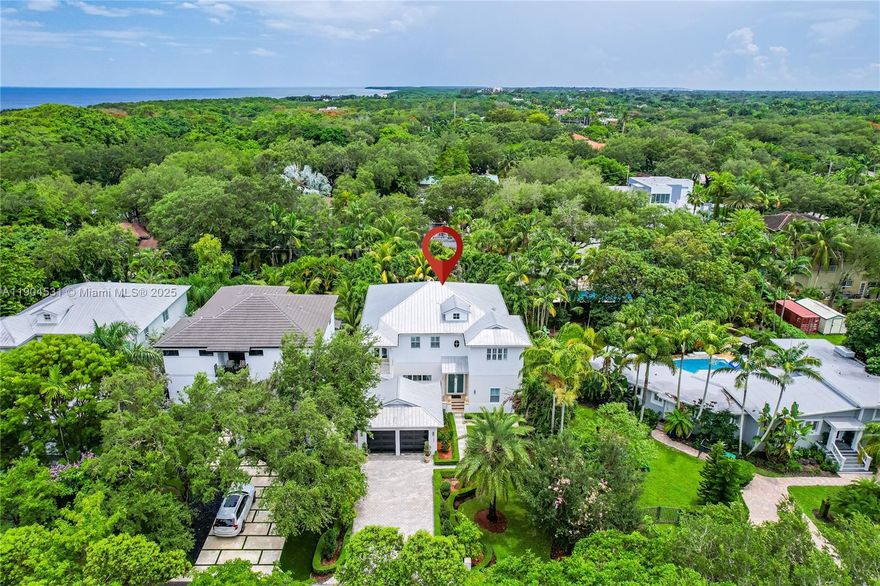 Experience modern elegance in this stunning 4BD/4BA two-story pool home in the heart of Palmetto Bay. Built in 2013, it offers 3,360 SF of open living with soaring ceilings and abundant light. The main level features formal living & dining, a chef’s kitchen with wood cabinetry, stone counters, SS appliances & island overlooking the family room and pool. Includes a 1st-floor bedroom & full bath ideal for guests or in-laws. Upstairs, the primary suite has a balcony, two walk-in closets & spa bath. Enjoy a tropical backyard oasis with pool & sun patio. Impact windows, metal roof, 2-car garage. East of Old Cutler, near Deering Estate & A-rated schools. Come see it Today!