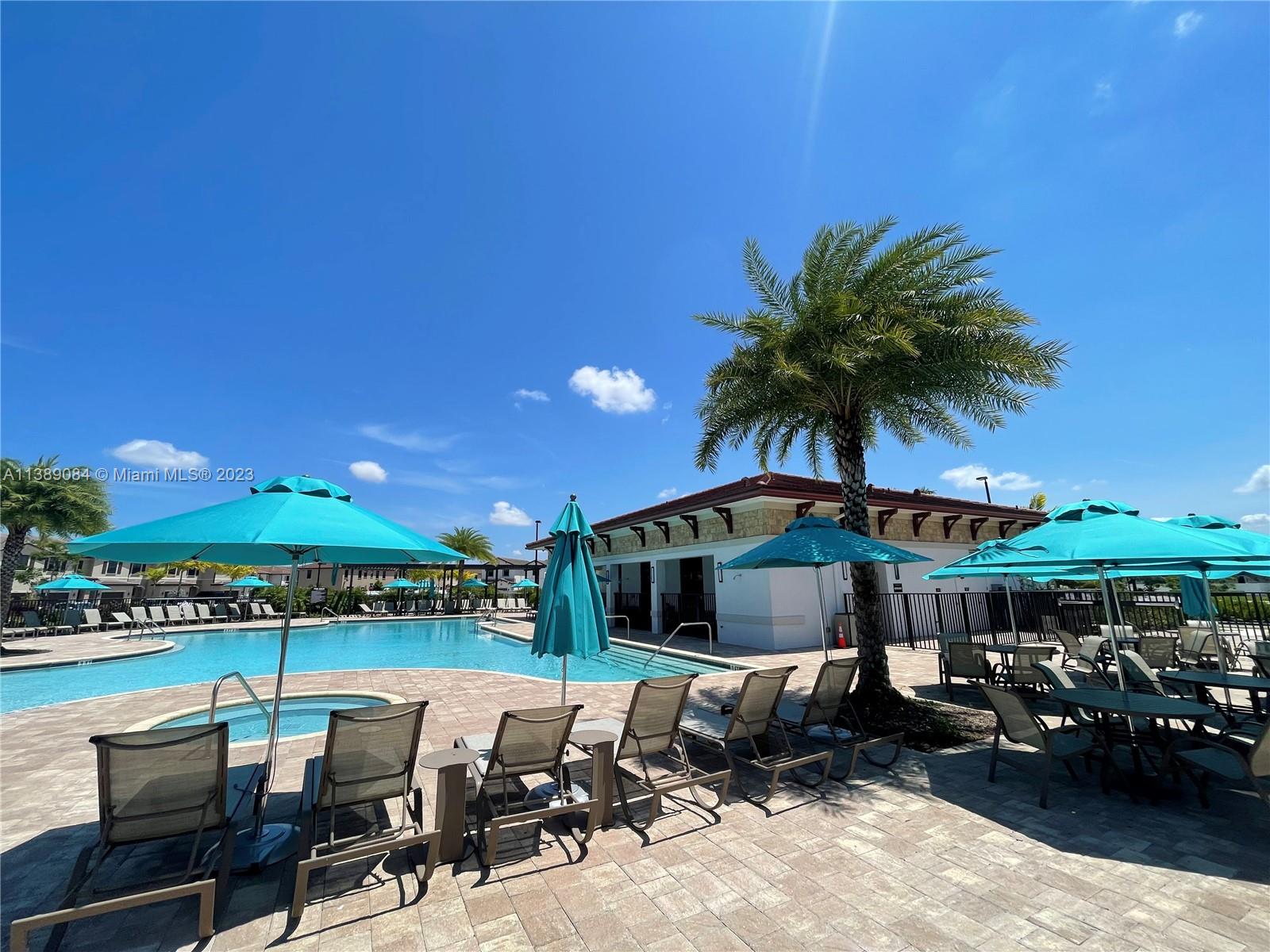 Brand New Villa At The Prestigious Aquabella Community! this unit has the Best huge floor plan, and oversize lot-Backyard with no neighbors behind, the best location in Hialeah Gardens, 3 Bedrooms and 2.5 bathrooms,The community has an ideal location near Miami Lakes with excellent Schools, Shopping and Restaurants within minutes, as well as easy access to major thoroughfares such as Ronald Reagan Turnpike and US Route 27. Homeowners can also enjoy a wide variety of Community amenities, such as a private lake and a deluxe Clubhouse with a swimming pool, Gym and Kids room, Kids water Park, Dog park, etc. This house have rolling Shades and Blackout, modern lamp, and more.