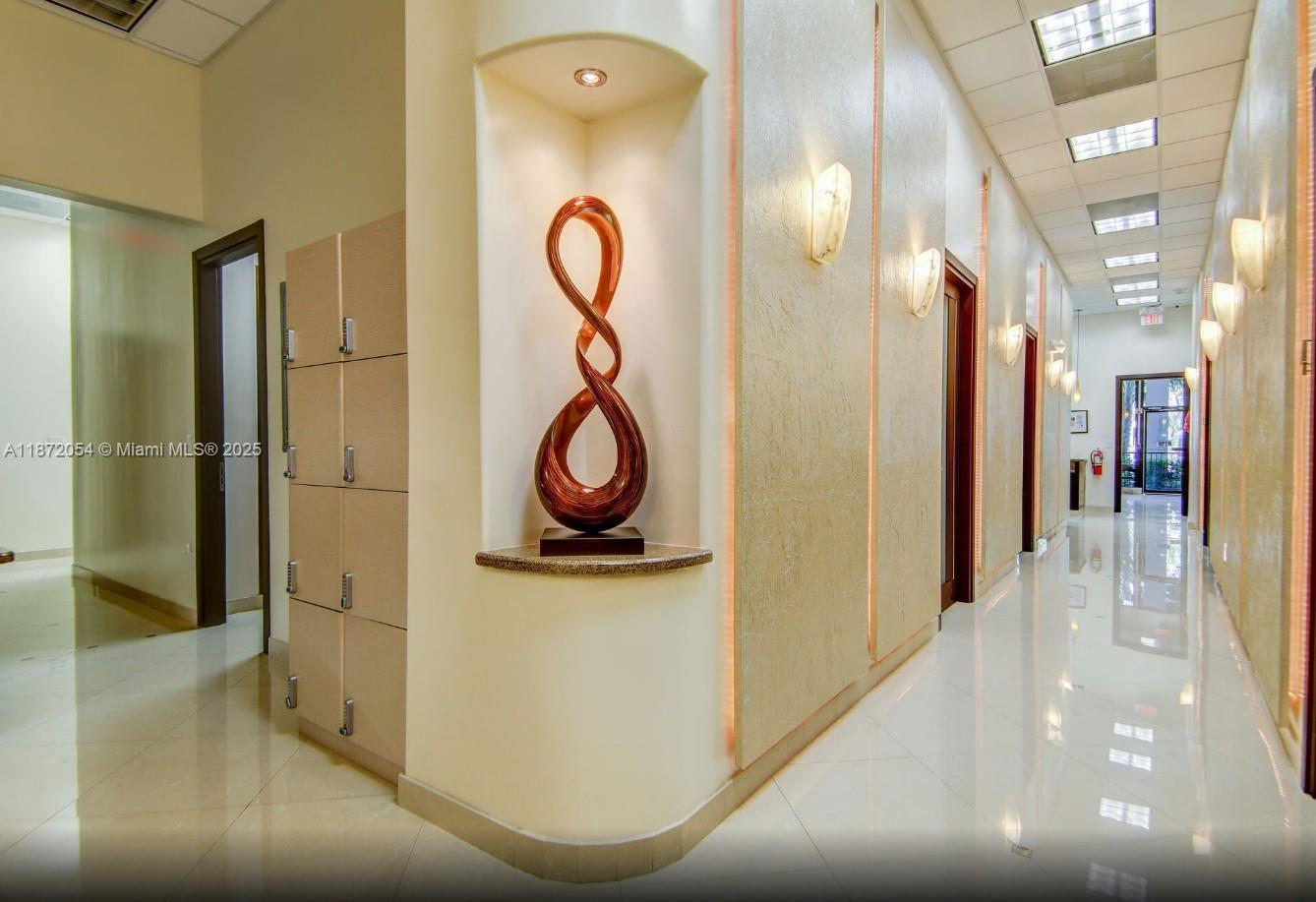 Ground-floor turnkey medical office condo at the Hallmark on Ocean Drive 4,945 SF fully built out with reception, exam/consult areas and 18' ceilings. 15 reserved surface parking spaces included. Prime location directly across from the ocean and diagonally across from the Diplomat Resort; minutes to Golden Beach and Sunny Isles. Professional setting with building signage opportunities and high visibility. Ideal for owner-user medical practice seeking beachside access, patient convenience, and a polished image.
