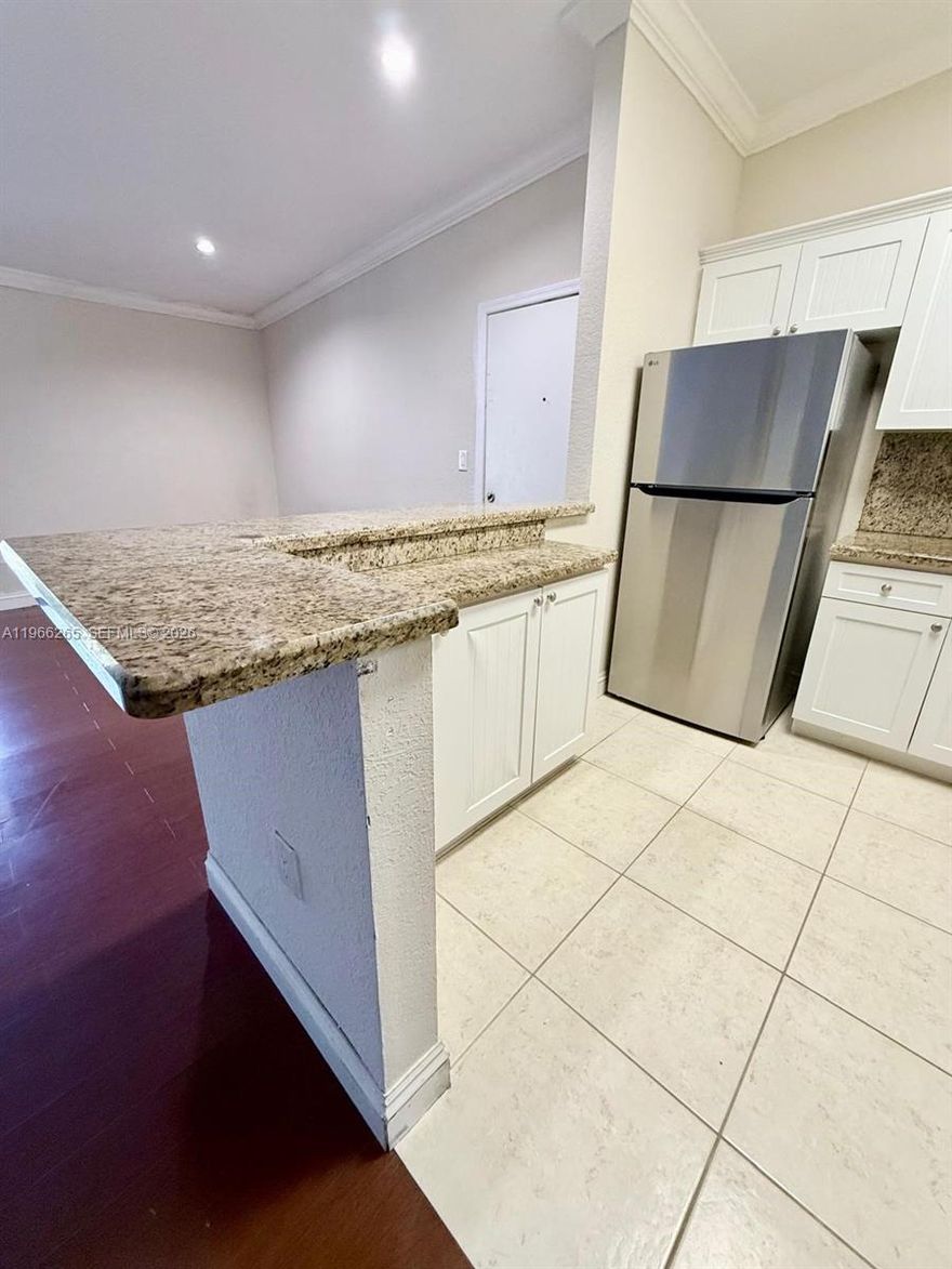 Very well kept unit in the North Miami area. Two bedrooms, one full bathroom, updated kitchen with stainless steel appliances and granite counters, laundry area in the balcony. Close to main avenues and shopping centers. Freshly painted and sparkling clean. Water is not included in the rent.