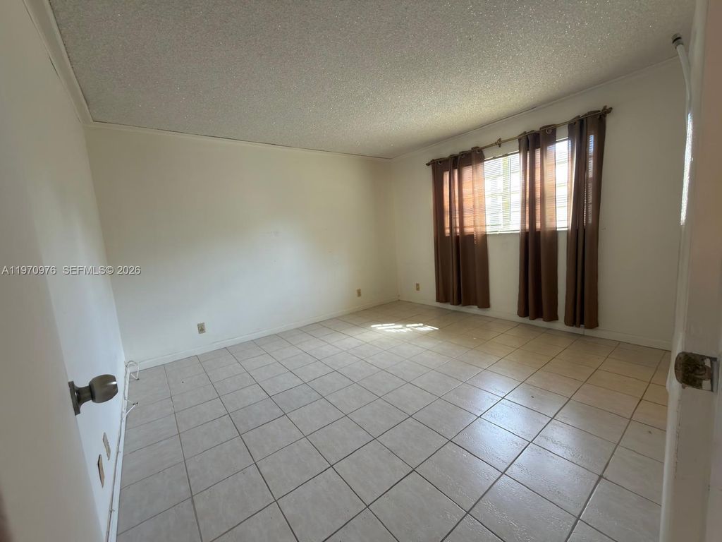 Photo of 30 SE 4th Ave #103, Hallandale Beach, FL 33009 (MLS # A11970976)
