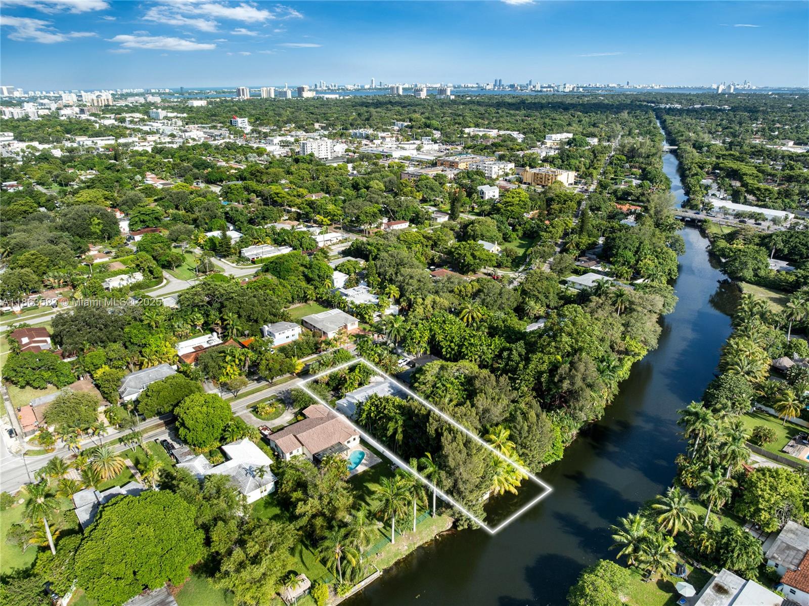 Waterfront opportunity on an oversized 17,550 SF lot (75’ x 234’) along a wide canal. The existing residence is in excellent condition—perfect to remodel and enjoy immediately, or redevelop with a brand-new luxury estate. The home offers spacious living areas, a large pool that can be updated to today’s standards, and solid bones throughout. With ample lot depth, generous water frontage, and an unbeatable location, this property combines endless potential with the rare chance to create a dream home on the water.