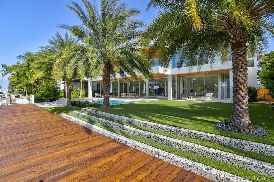 Fort Lauderdale's finest Organic High End Finishes & intelligent Architecture by Bob Tuthill, in exclusive Rio Vista. This modern home offers 100 ft of waterfront w/ new Ipe Dock & Seawall & 125 ft deep lot w/ Salt Chlorinated Heated Pool, Infinity Spa & tropical landscaping by George Keen. Eggersmann German engineered kitchen w/ Miele & Gaggenau appliances, Glass & Lacquer cabinets & Stainless Steel & Carrara Marble Counters. Legno Bastone European Wide Plank White Oak & Limestone Floors, Italian laminated hingeless magnetic doors, architectural reverse Metal Baseboards. Master Suite w/ Downtown Views, Calacatta Gold Marble & Eggersmann Closet w/ semi precious stone. Custom Elevator, Sub Zero Wine Cooler, Control4 Smart Home w/ integrated sound, security & lighting, Motorized Shades.