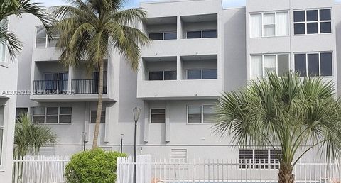 Photo of 1555 W 44th Pl #203, Hialeah, FL 33012 (MLS # A12028212)
