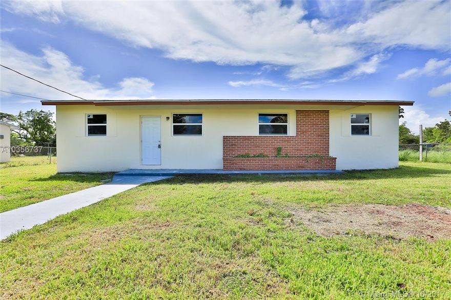 Beautiful 4 bedroom, 2 bathroom house in Apline Heights. Spacious living area, updated kitchen, newly installed impact windows, exceptional front and back yard. Awesome location, with nearby major roads such as S Dixie Hwy and the Turnpike. Not far from the Miami Zoo and public schools. Don't miss out on this amazing opportunity, schedule your showing today!