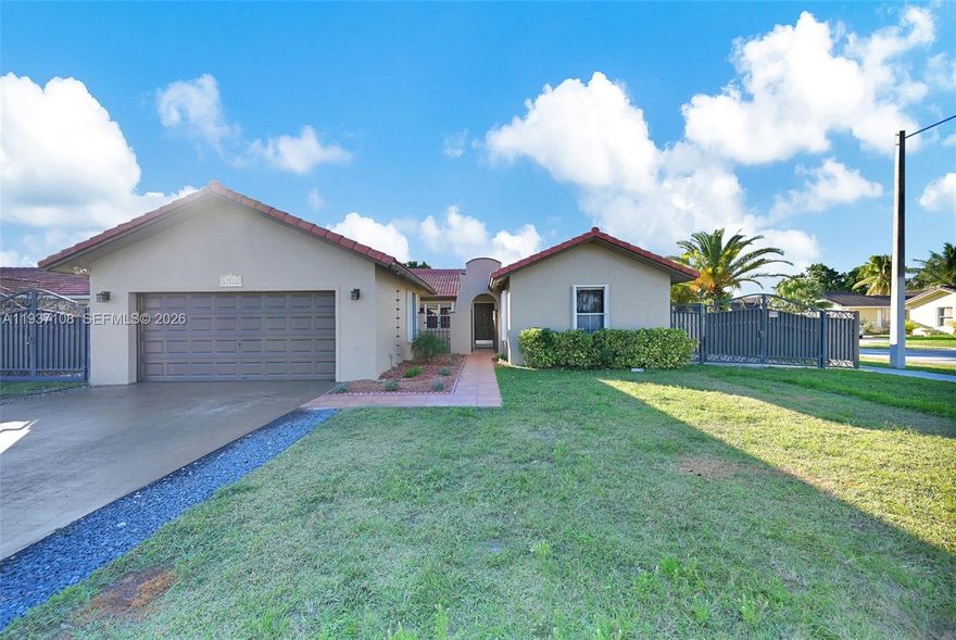 Welcome to one of Miami’s most desirable communities. This beautifully maintained 3 bedroom & 3 full bathroom home offers 1,887 sq ft under air and 2,531 total sq ft, sitting on an 8,277 sq ft lot w/ ample room for an RV or boat. Built in 1996, the home features an open layout , high ceilings & large windows that fills the space w/ natural light. The kitchen is perfect for gatherings, complete w/ granite countertops & stainless steel appliances. A Patio that elevates the entertainment experience. Step into your private outdoor retreat featuring a fenced backyard & an aluminum awing, ideal for year-round lounging and a large shed that is currently a gym. The spacious primary suite includes an in-suite bath with glass-enclosed shower plus a walk in closet. Additional storage continues in the 2-car garage. Tile throughout, laundry room, driveway parking. Close to Turnpike, hospitals, shopping, restaurants, Costco, Publix, Home Depot etc.