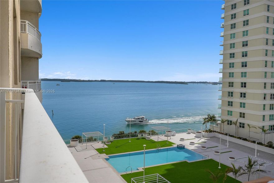 Move to Exclusive Brickell Key! Discover this bright and spacious 1-bedroom, 1-bathroom unit with balcony offering stunning views of Biscayne Bay and Isola's new amenities pool deck. Featuring marble floors throughout and tile floors in the bathroom and kitchen.  Sleek granite counter tops in the kitchen and bathrooms as well as in- unit washer and dryer for comfort. One assigned covered parking space.  Brand new A/C. Valet parking, 24 hour concierge, bay front gym, tennis court, business center, club room & on-site management.  Blissful and relaxed Island Living, walking distance from exciting Brickell City Center, filled with award winning restaurants, shops and more!
