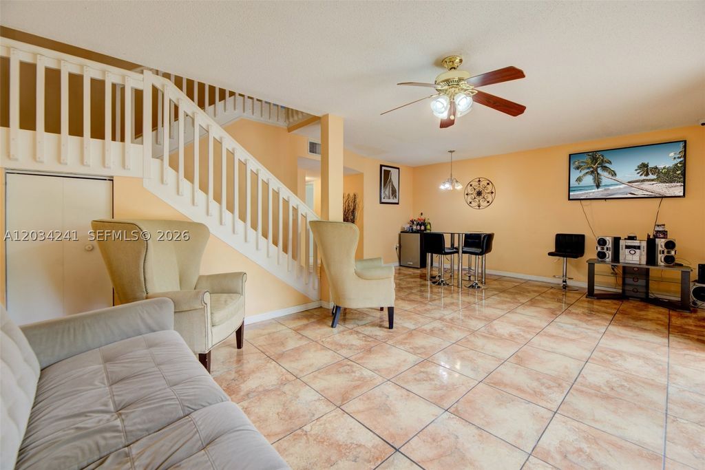 Photo of 7661 NW 38th Ct, Sunrise, FL 33351 (MLS # A12034241)