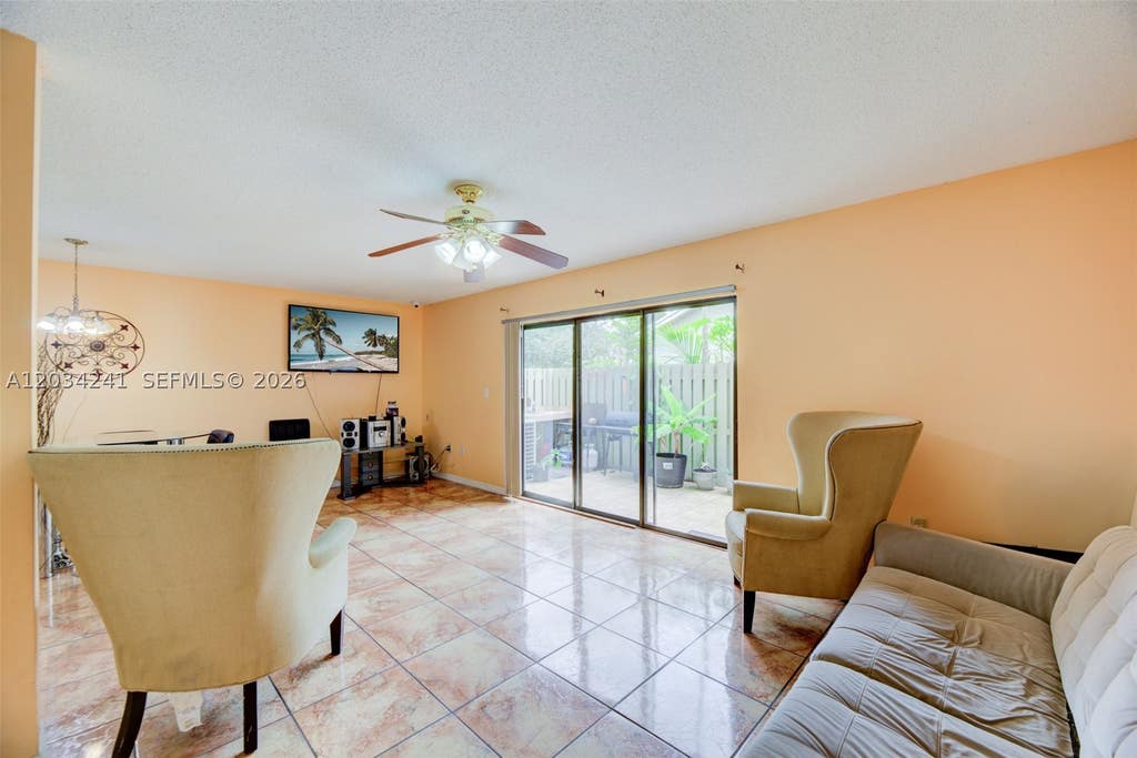 Photo of 7661 NW 38th Ct, Sunrise, FL 33351 (MLS # A12034241)