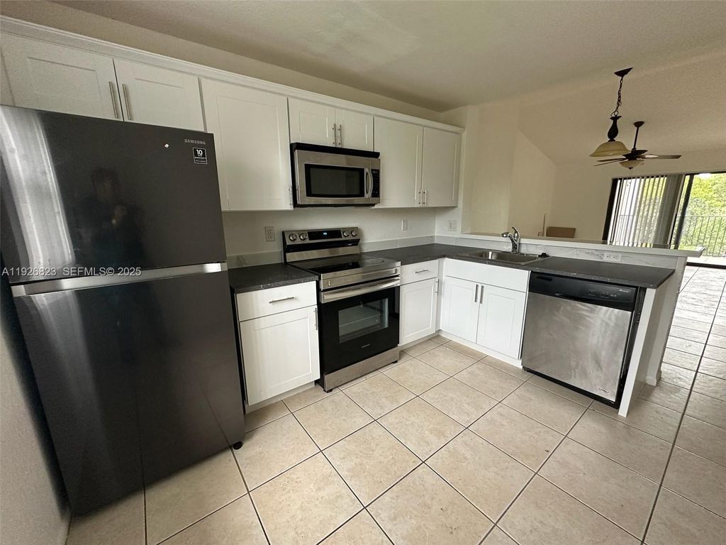 Photo of 10115 W Sunrise Boulevard #306, Plantation, FL 33322 (MLS # A11926823)