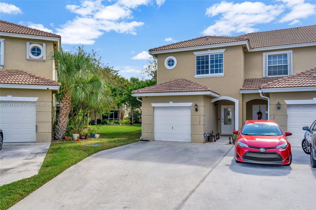 Photo of 12124 SW 4th St, Pembroke Pines, FL 33025 (MLS # A11476936)