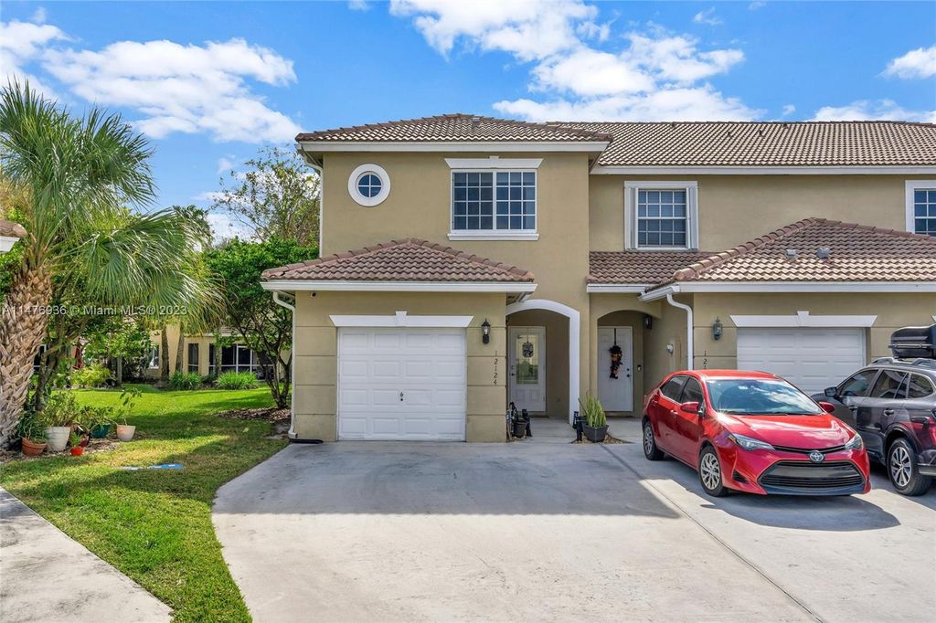 Photo of 12124 SW 4th St, Pembroke Pines, FL 33025 (MLS # A11476936)