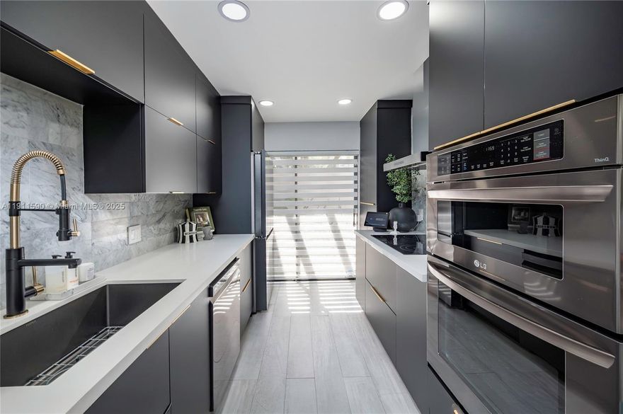 Fully renovated 2BR/2BA single family townhouse in East Lakes, recently updated with top-quality finishes and meticulous attention to detail. Features a stunning modern kitchen with custom cabinetry, quartz counters, and stainless steel appliances. Bright open living area flows to an expansive covered patio and private fenced yard—perfect for entertaining. Primary suite offers spa-style bath, frameless glass shower, and custom walk-in closet. Enjoy resort-style amenities including pool, playground, and scenic lake views. Conveniently located near shopping, dining, major highways, and top-rated schools.