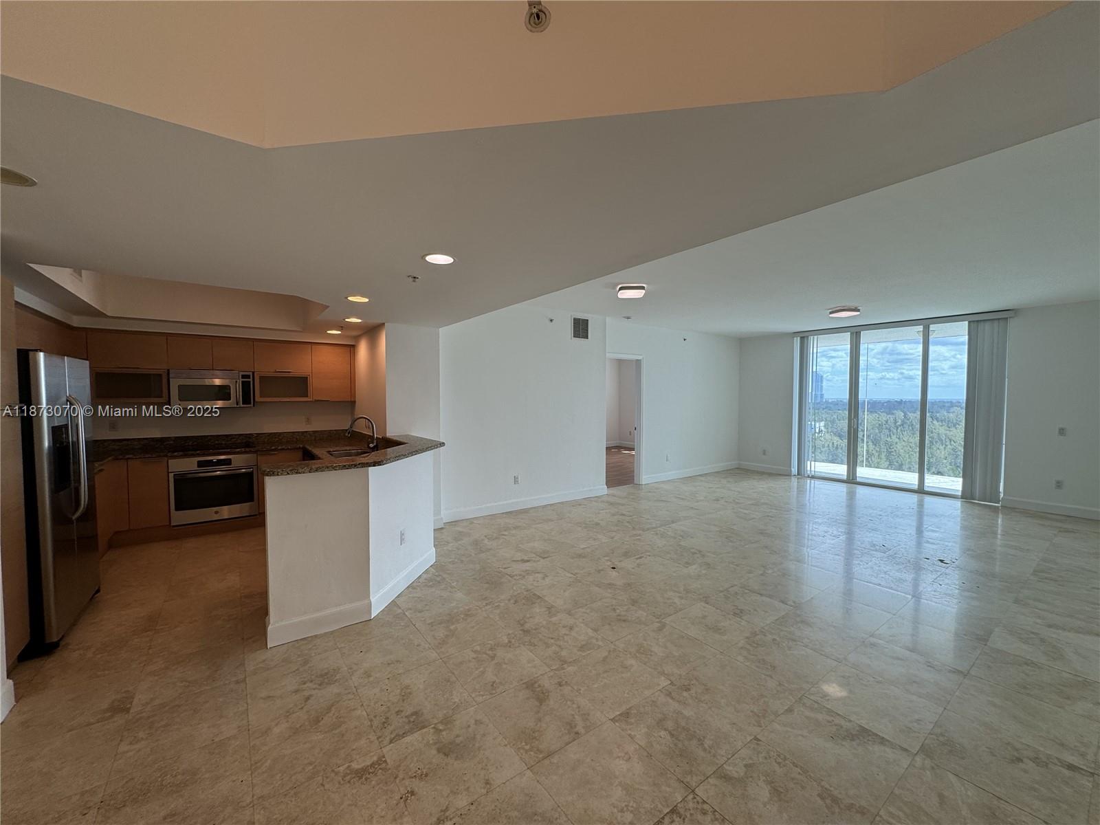 Spacious and bright 2-bedroom, 2-bath residence at ONE FIFTY ONE @ Biscayne! This well-appointed unit features an open-concept layout, modern kitchen with granite countertops and stainless steel appliances, and a private balcony with serene city and bay views. Primary suite includes a walk-in closet and a large bathroom with dual sinks, shower, and soaking tub. Enjoy resort-style amenities including pool, fitness center, tennis courts, 24-hour security, and more. Ideally located atthe center of SoleMia "Neighborhood", near Aventura Mall, FIU North Campus, and Oleta River Park. A perfect combination of comfort, convenience, and lifestyle.