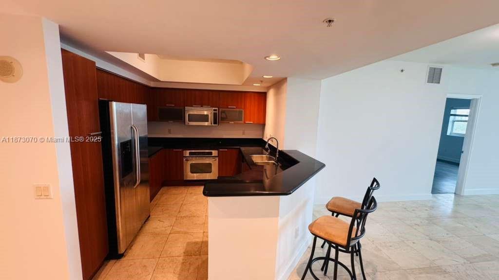 THE OAKS I CONDO - Residential Lease